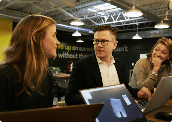 MAG Hero Image of Rob's happy clients — a diverse group of smiling adults, all looking confident and empowered